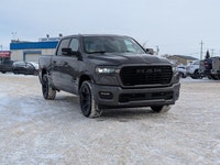 The 2026 Ram 1500 Sport in Granite Crystal Metallic delivers a commanding presence with a sleek Blac... (image 8)