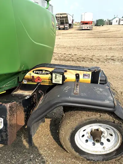 42' Header Trailer, JD Mounts, Fenders, Lights, Brakes. At Rosetown Dealership. Call or Text: Morgan...