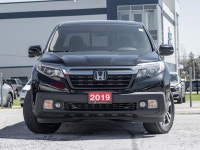 Experience the perfect blend of pickup capability, everyday comfort, and Honda reliability with the... (image 1)