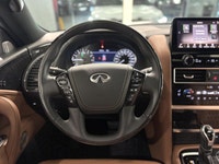 The 2023 Infiniti QX80 ProActive is a powerful and refined SUV, driven by a 5.6L premium engine that... (image 8)