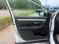 A practical compact SUV with a spacious interior, efficient performance, and modern safety features,... (image 6)