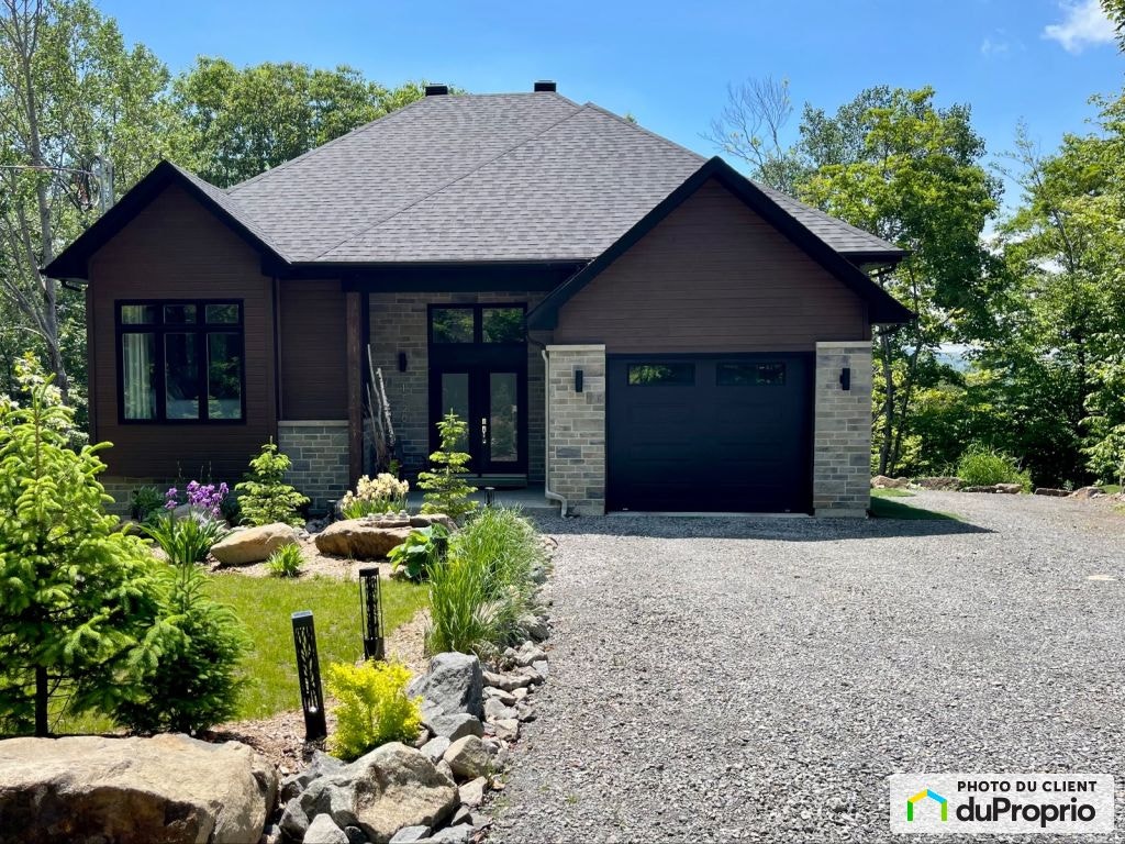 $949,000 - Bungalow for sale in Ste-Adele — photo 1