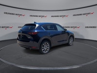 Finished in blue with a black interior, this used 2021 Mazda CX-5 GT AWD brings together upscale com... (image 7)