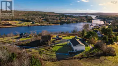 Welcome home to this incredible river-view property in the heart of Sheet Harbour.Perfectly situated...