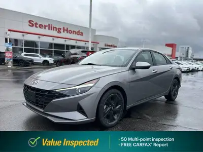Navigate with confidence and comfort in the 2023 Hyundai Elantra Preferred. This stunning Fluid Meta...