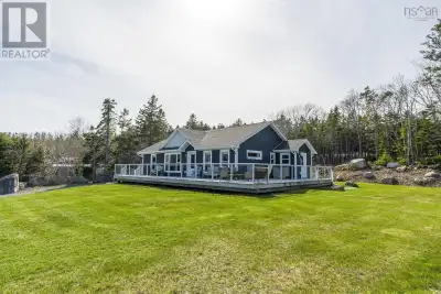 Welcome to 27 Prospect Bay Road, ideally located just minutes from Prospect Village, scenic walking...