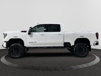 Welcome to Capital GMC! *This 2026 GMC Sierra AT4 2500HD Capital Custom Lifted Truck in Summit White... (image 1)