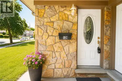 Beautifully renovated freehold townhouse in a quiet, family-friendly neighborhood, backing onto a pa...