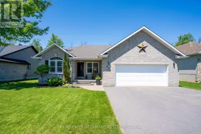 Welcome to this beautifully maintained 1485 sq. ft. stone bungalow, nestled in the highly sought-aft...