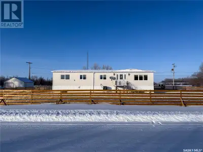 Welcome to 201-203 4th Avenue in Climax, SK! This 1,421 sq. ft. double-wide modular home sits on two...