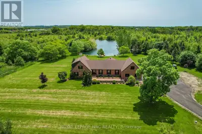 Welcome to 2021 Victoria Avenue, a breathtaking bungalow loft-style estate set on over 30 acres of p...