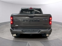 The 2026 Ram 1500 Sport, presented in a sophisticated gray finish, offers powerful 44 capabilities c... (image 3)