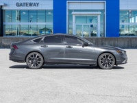 The 2024 Honda Accord Hybrid Touring commands attention in a refined Grey finish that highlights its... (image 2)