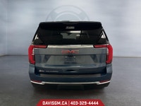 The 2025 GMC Yukon XL Elevation 4WD commands attention with bold styling, extended cargo versatility... (image 3)