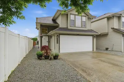 Experience the perfect blend of style & convenience in this 2,050 sq. ft. basement-entry home in bea...