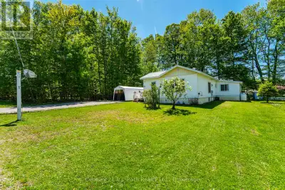 Welcome to Unit 51 at 5263 Elliott Sideroad, tucked inside the peaceful Bramhall Community by Parkbr...