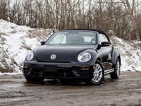 This Volkswagen blends iconic design with open-air driving fun. This vehicle has no reported acciden... (image 2)