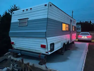 Camper trailer Sleeps 4 Sitting on concrete slab Kitchen stove. sink, fridge, mw oven Bathroom toile...