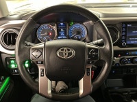 Among midsize pickups that talk tough but feel soft when the work gets real, this 2021 Toyota Tacoma... (image 9)