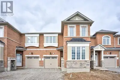 Absolutely gorgeous, executive townhome! This 1800+ square foot home includes extensive builder upgr...