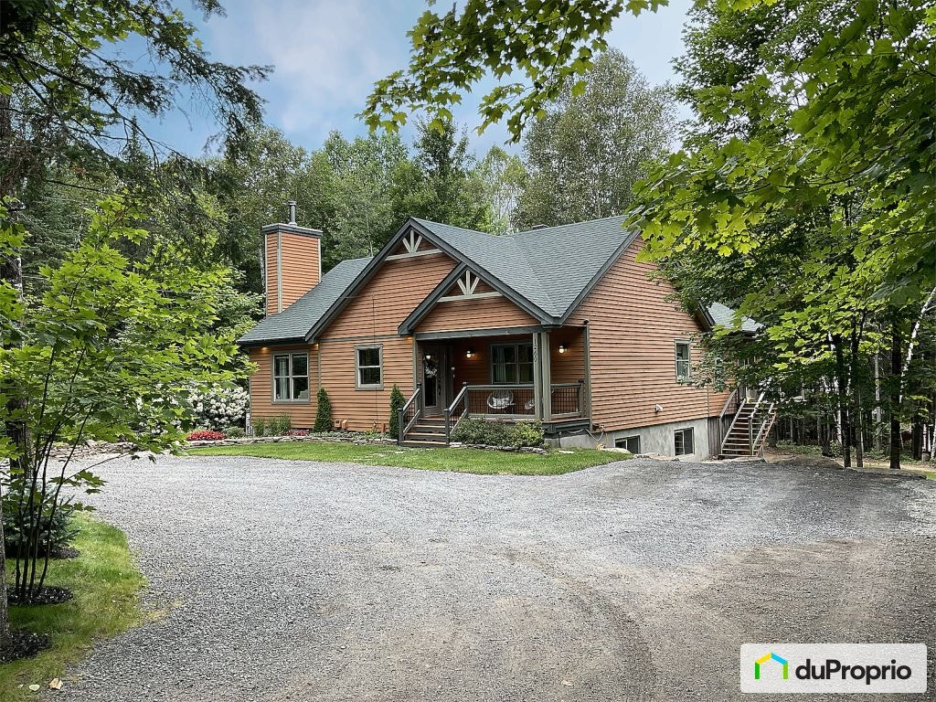 $949,000 - Bungalow for sale in Ste-Adele — photo 1