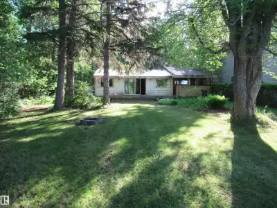 Sundance Beach! Older original owner lakefront cabin is fully serviced with a drilled well, power, n...