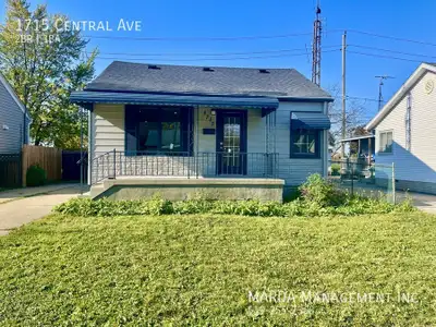 Welcome to 1715 Central Ave, a beautifully renovated 2-bedroom, 1-bathroom home with a versatile den...