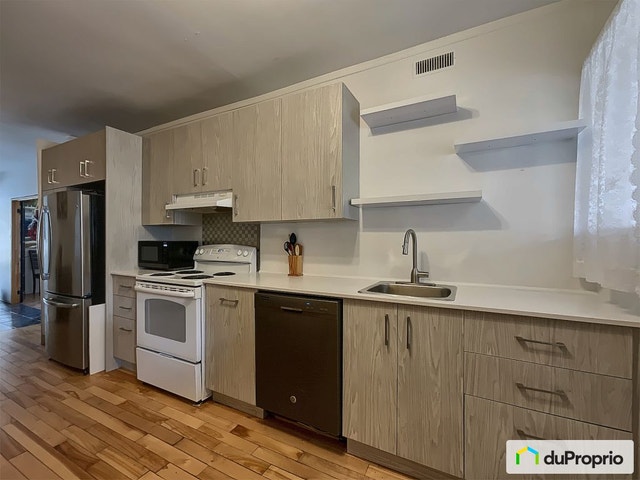 111e rue — photo 2