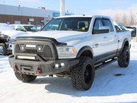 This 2014 Ram 3500 Longhorn is a local trade-in with two keys and lom km's, under the hood sits the... (image 5)