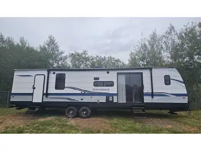 Beautiful Springdale park model by Keystone RV. One owner, professionally maintained. Front living r...