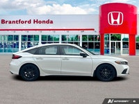 Boasting a spirited turbocharged engine, this 2022 Honda Civic Hatchback Sport Touring redefines dyn... (image 7)