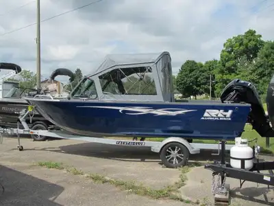 EASTERN ONTARIO'S EXCLUSIVE RH ALUMINUM BOAT DEALER TOWN AND COUNTRY RV PRESENTS THIS STRIKING VIVID...