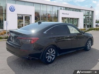Perfectly blending efficiency with smart technology, the 2023 Honda Civic Sedan LX arrives ready for... (image 4)