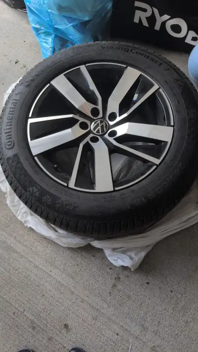 Selling a set of OEM Volkswagen alloy wheels mounted on premium Continental VikingContact 7 winter t...
