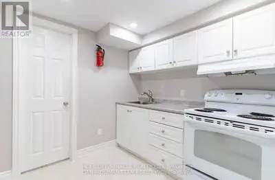 This Legal Basement Studio Apartment Has Its Own Separate Walk-Out Entrance comes With A Kitchen Fri...