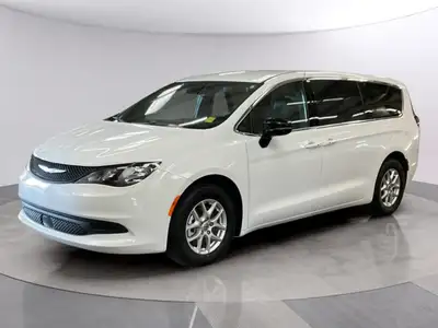 The 2025 Chrysler Grand Caravan SXT 2WD in pristine white and front-wheel drive is a remarkable van...
