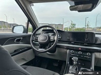 This *2023 Kia Carnival LX* blends minivan practicality with SUV-inspired styling. Powered by a smoo... (image 8)