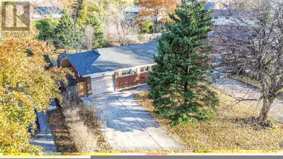 Welcome to this well-maintained brick bungalow, featuring a bright and functional main floor with a...