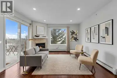 Top Floor Corner Unit with Incredible Natural Light in Prime Location! Welcome to this bright and be...