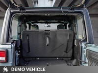 This Jeep Wrangler boasts a Intercooled Turbo Premium Unleaded I-4 2.0 L/122 engine powering this Au... (image 7)