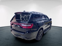 Step into the sophisticated allure of the 2024 Dodge Durango R/T Plus AWD, a striking SUV clad in a... (image 3)