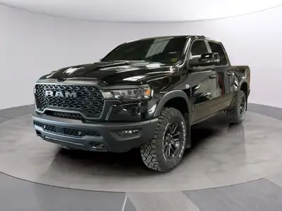 The 2026 Ram 1500 Rebel in Black, featuring a robust 4x4 drivetrain and precision handling, is ready...