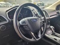 This 2016 Ford Edge SEL finished in Blue with a Black interior pairs a peppy EcoBoost 2.0L Turbo I4... (image 8)