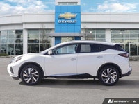 Command the urban landscape and embark on memorable journeys in this striking Pearl White Pearl Meta... (image 1)