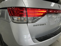Our used family-friendly 2014 Honda Odyssey Touring is shown in stunning Alabaster Silver Metallic.... (image 9)