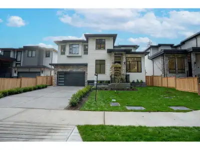 Motivated Seller. Custom 8 bedroom, 6 bathroom home offers (2+1) suites. The main floor offers an in...
