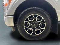 Experience the renowned 2022 Ford F-150 XLT 4x4 SuperCrew in a striking Silver finish, built for bot... (image 9)