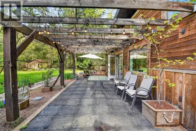 Set on a private and beautifully usable 0.92-acre fully fenced property, this unique offering is all...