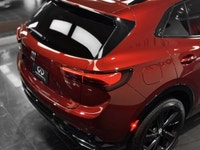 The 2024 Buick Envision Sport Touring (ST) is a premium compact SUV that received a significant refr... (image 7)