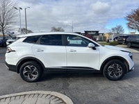 Awarded an IIHS Top Safety Pick, the 2023 Kia Sportage LX in striking Snow White Pearl ensures peace... (image 3)